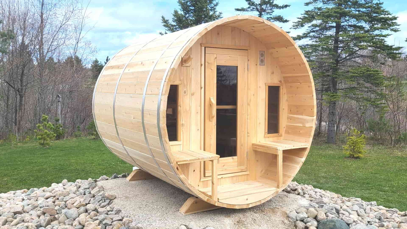 barrel sauna outside in home backyard 