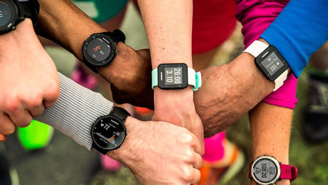 group of people showing their Garmin watches 