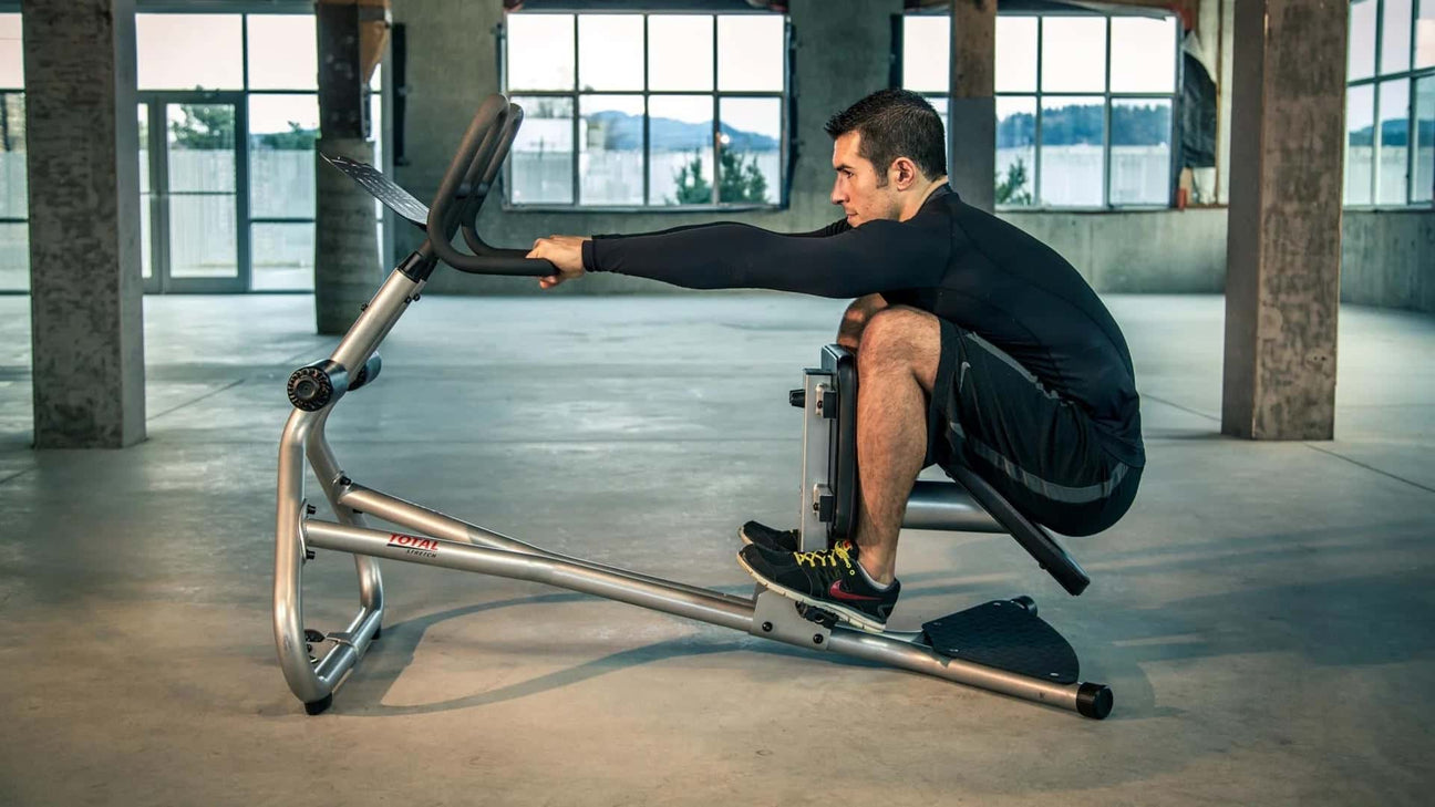 man using motive fitness stretching machine