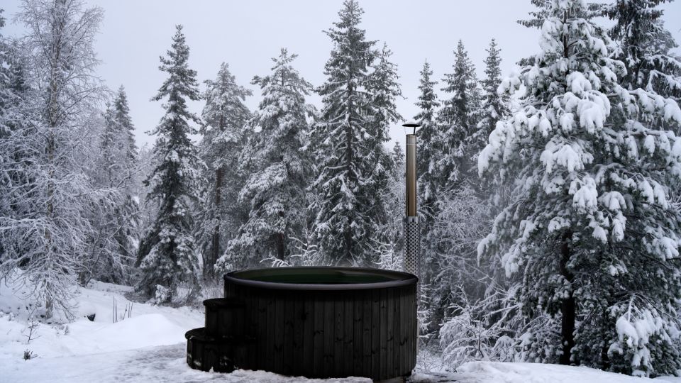 saunalife outdoor wood fired hot tub lifestyle in winter setting jpg 