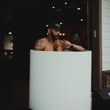 Man Checking Watch While Using Cold Life Plunge Ice Bath Tub Bundle Lifestyle Image 