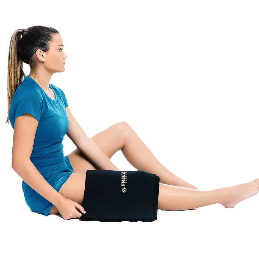 freeze sleeve relaxing on woman knee while sitting