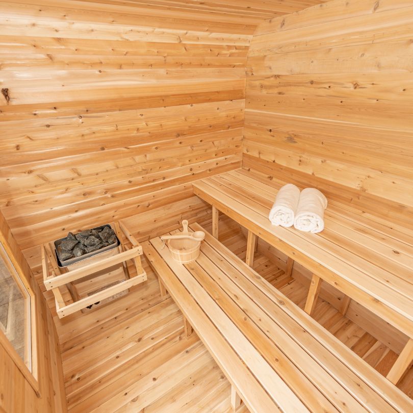 inside of sauna facing benches and wall