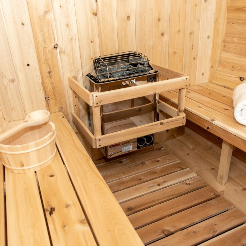 barrel sauna mockup inside showing heater compartment 