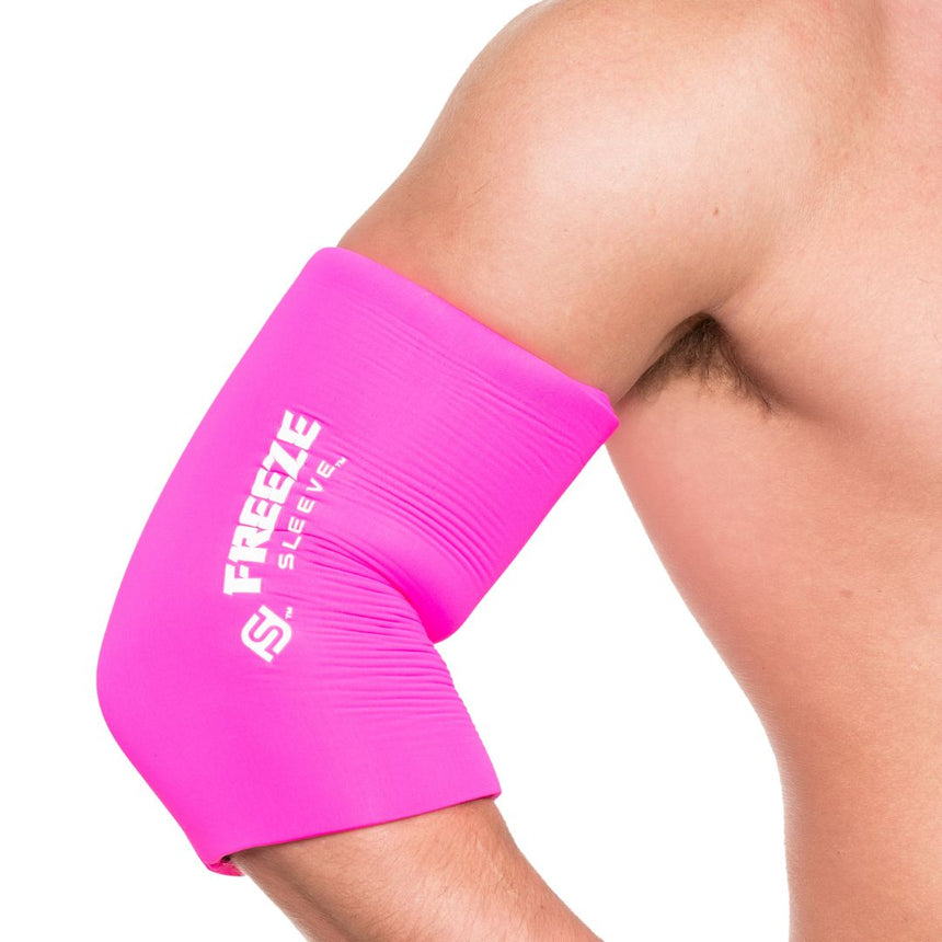 closeup of man wearing pink freeze sleeve on right elbow