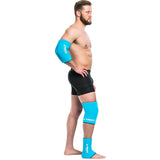 man wearing turquoise freeze sleeve on right elbow, knee, and ankle