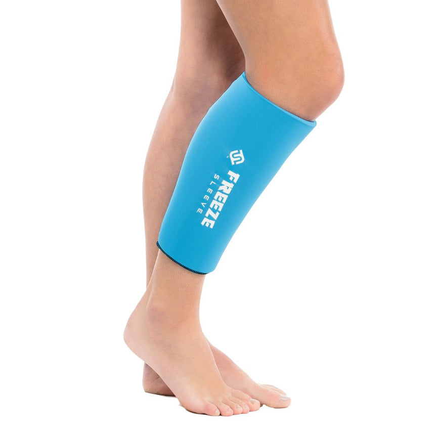 woman wearing turquoise freeze sleeve on right calf