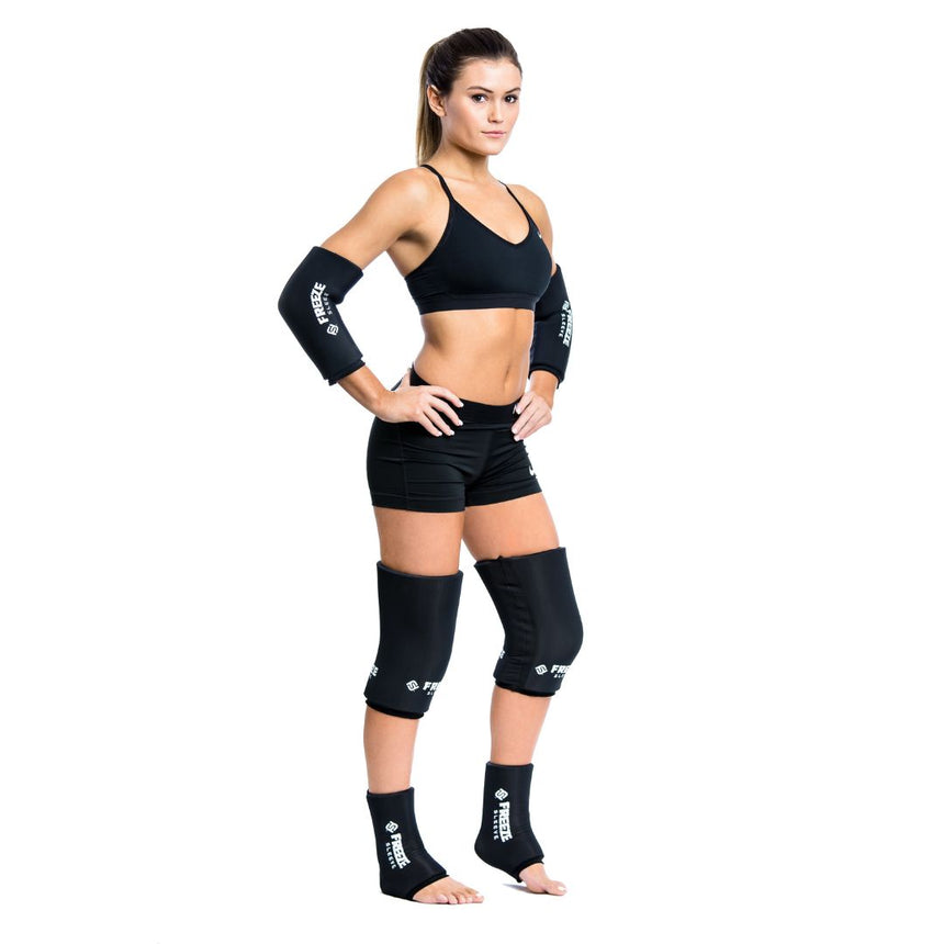woman wearing black freeze sleeve on elbows, knees, and ankles