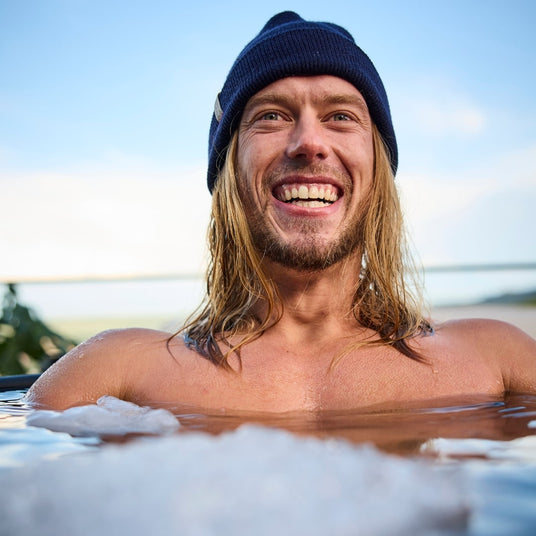 Man smiling in Ice Barrel 300 Cold Plunge Tub