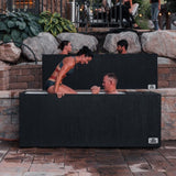 Couple using King Kool Cold Plunge Tub outdoors