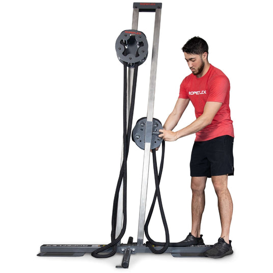 Man using RX1500 Adjustable Dual Station Vertical Rope Pull Machine