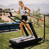 Woman using Optimill® Flat Motorless Treadmill