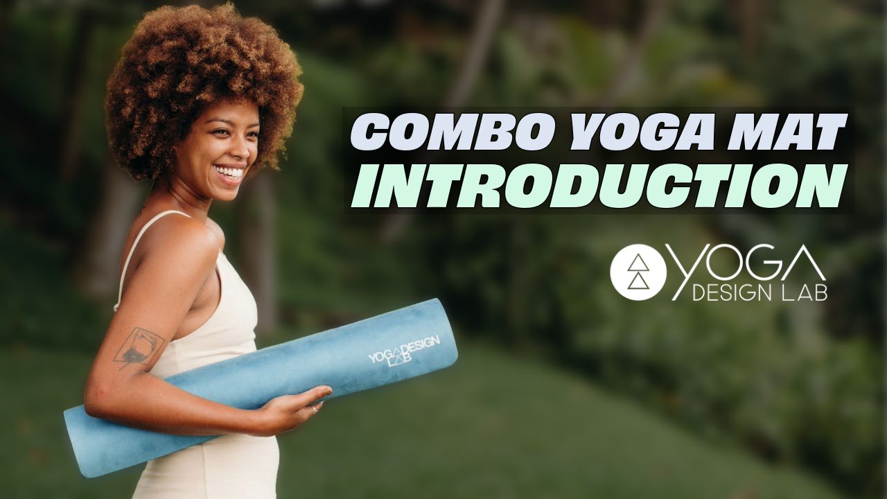 Woman holding Yoga Design Lab Combo Mat in naturistic setting