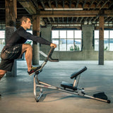 Man using Motive Fitness TotalStretch TS200 in gym